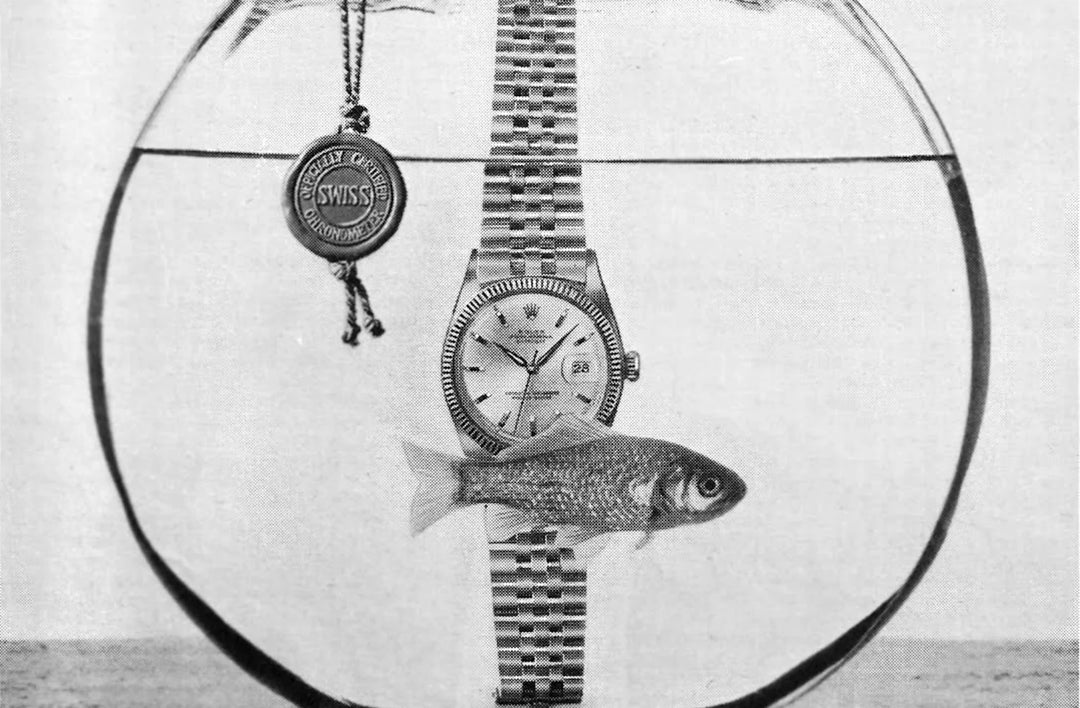 advertisment-vintage-watch-waterproof-goldfish-jar