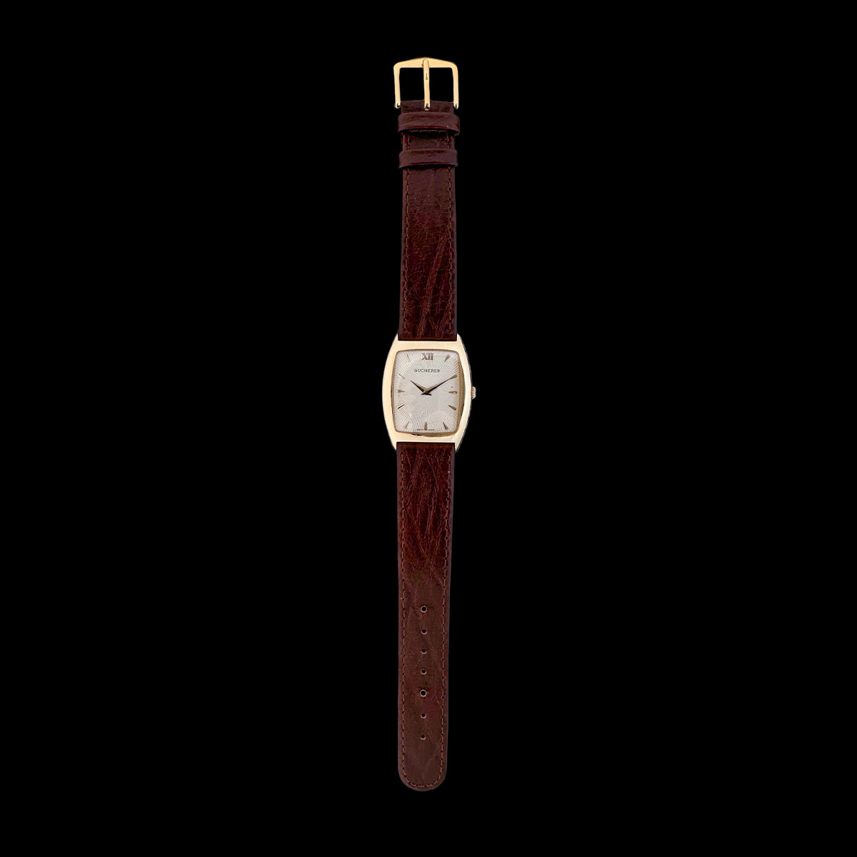 Bucherer Sunburst Tonneau 18K